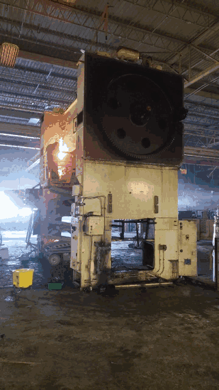 Video: the torch cutting into the press frame beside the flywheel