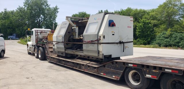 A Doosan Mecatec S700 CNC lathe chained down on our lowboy