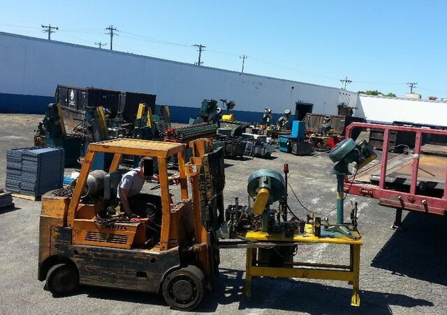 Machines from a full plant cleanout, staged in our yard