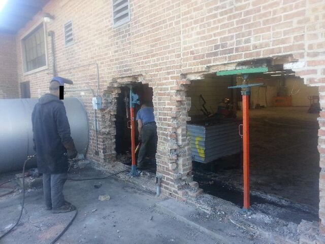 When no door is big enough: opening a brick wall to extract equipment
