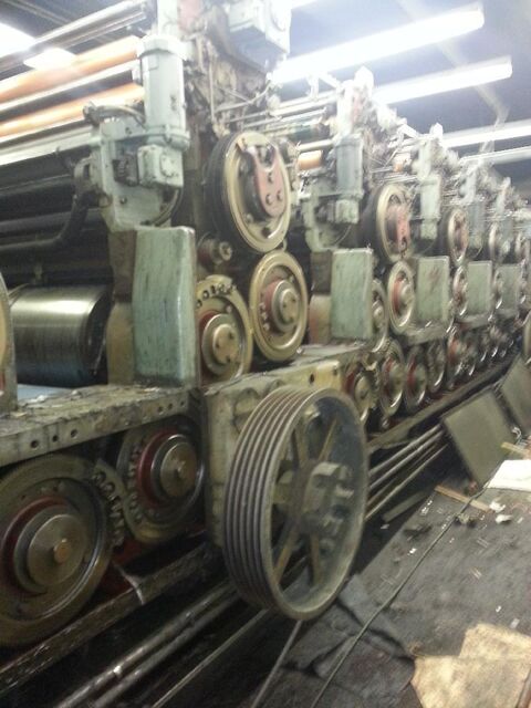 320,000 lb Miehle printing press removed in 26,000 lb sections
