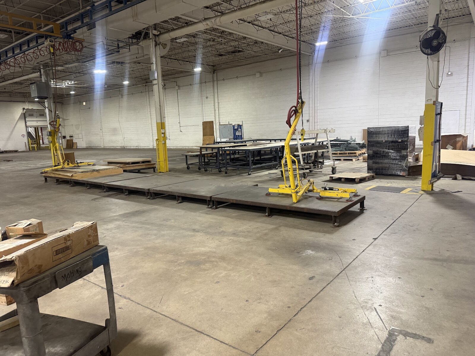 Cleaned plant floor after the CNC machinery was taken out