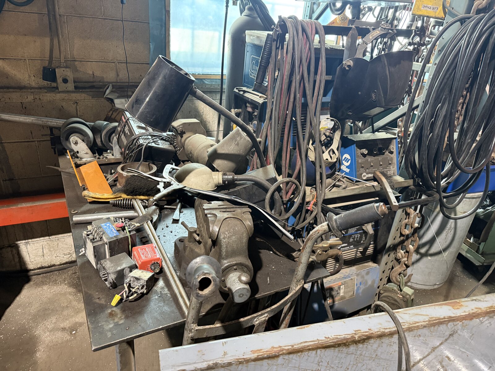 The welding bench with a vise, the TIG torch and air tools