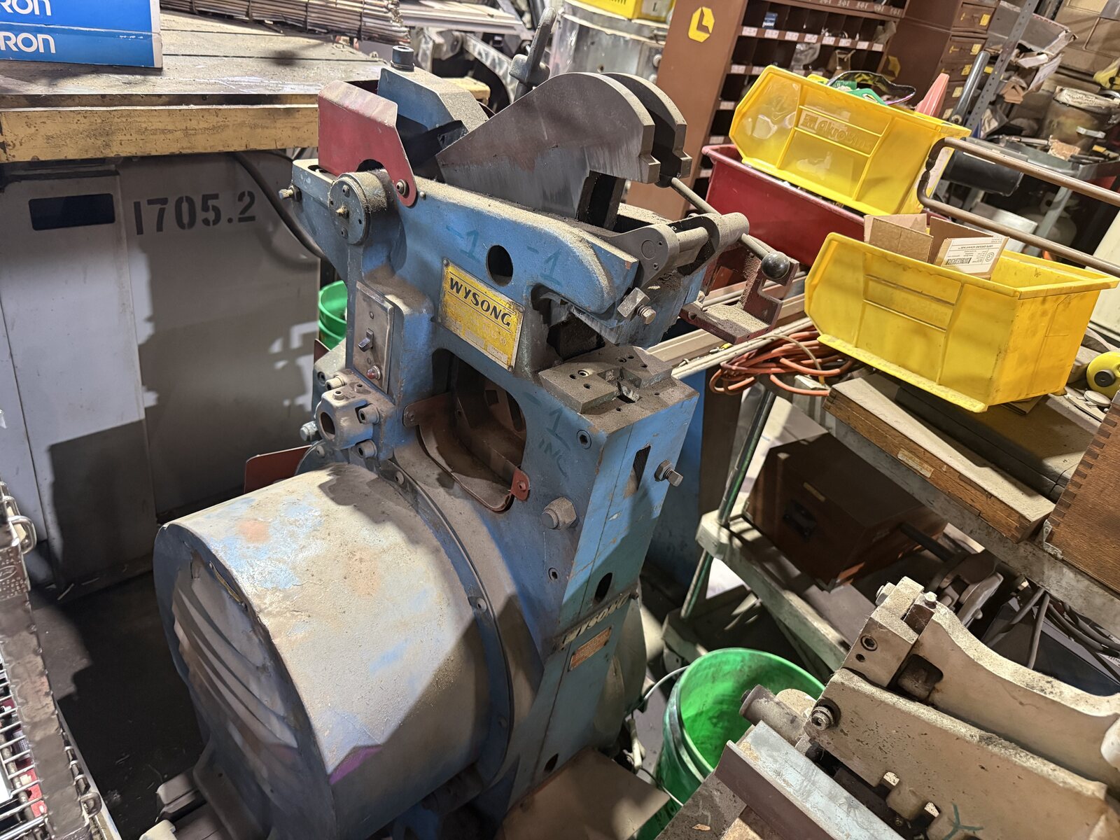 The blue Wysong metalworker, used mostly to cut angles and flats