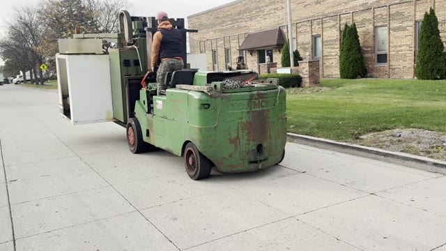 Our forklift driving the machine down the street (19 second video, no sound)