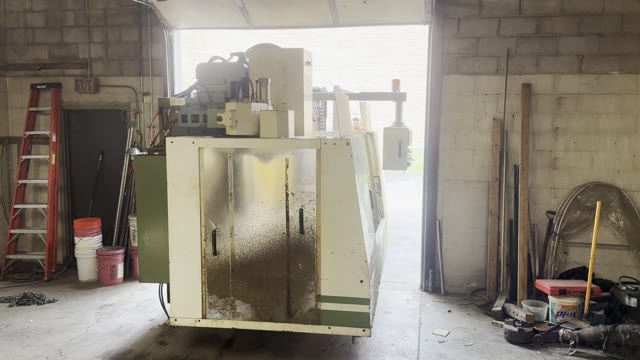 The Mighty Comet on the forks inside the shop, by the open door (16 second video, no sound)