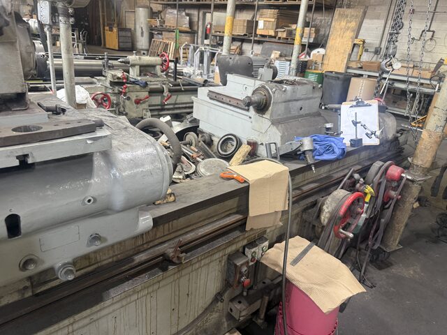Long-bed machines in a crowded shop