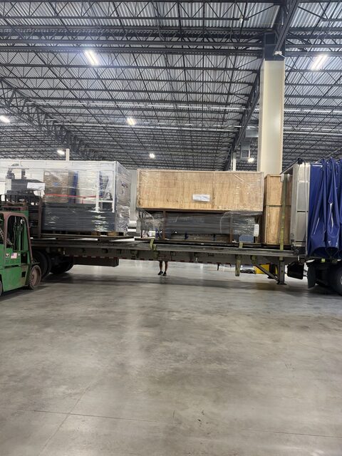 The laser machine and two crates on the trailer