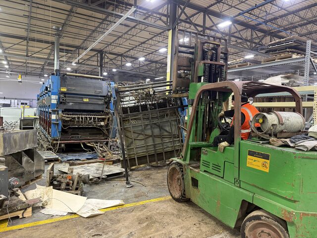 The end section of the press on the forks, pulled away from the line